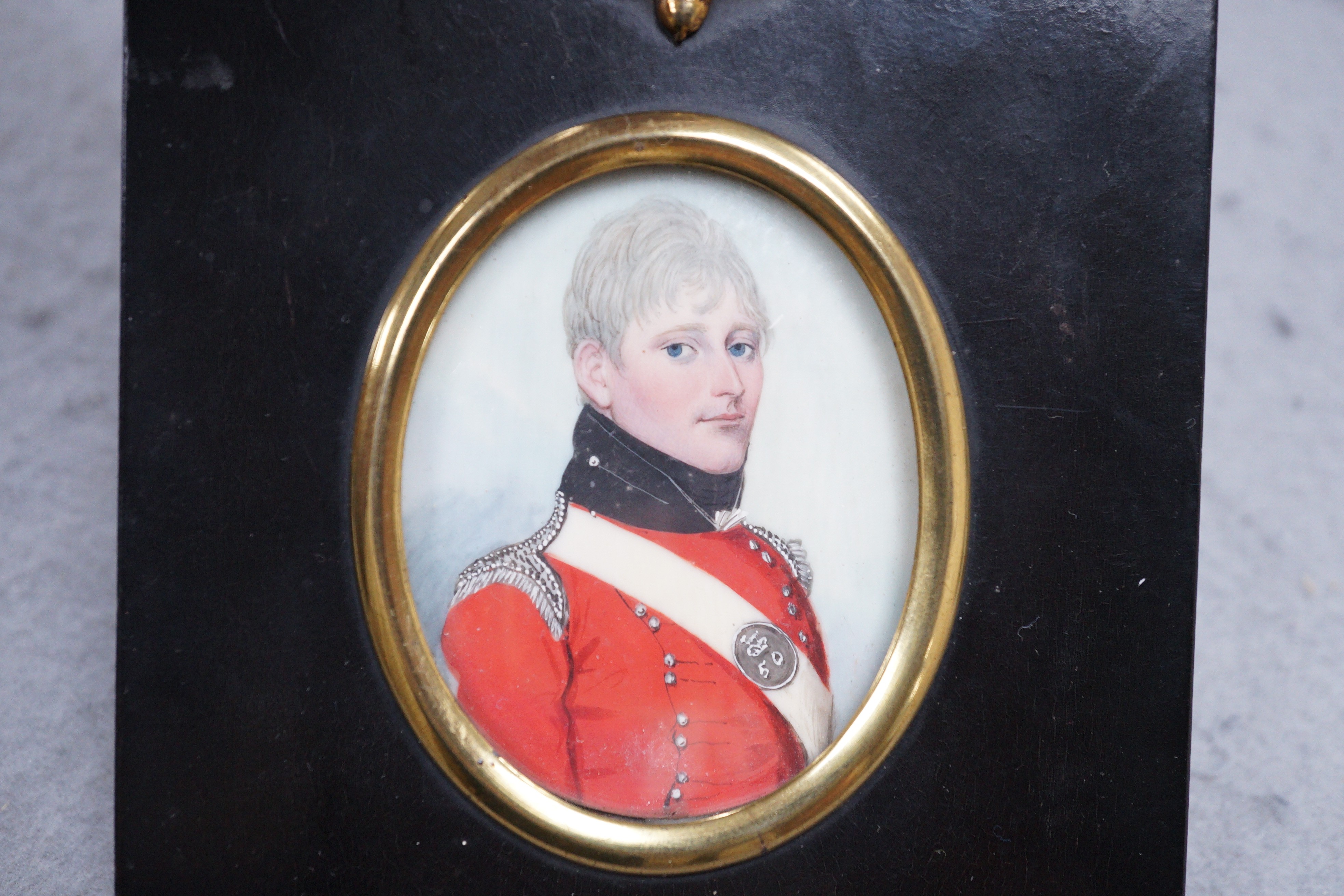 Attributed to Frederick Buck (Irish, 1771-1840), watercolour on ivory portrait miniature of an army officer, 6 x 5cm